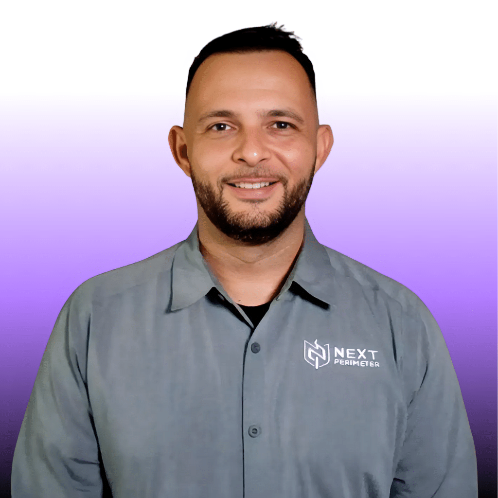 Professional headshot of Luy Teitelroit, CEO at Next Perimeter, posed in a business setting.