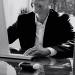 A smiling portrait of our satisfied customer, Dennis P., next to his testimonial.
