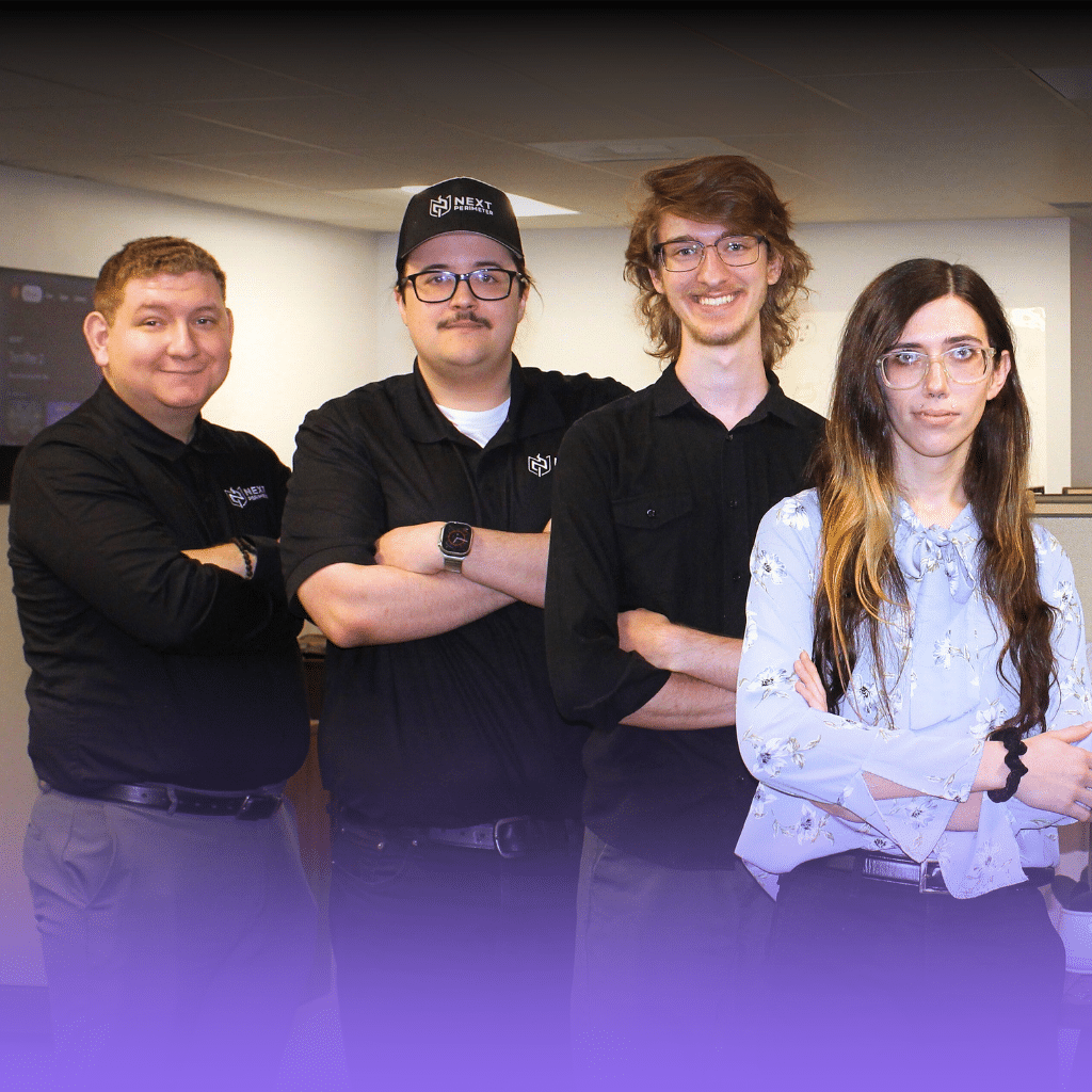 Group photo of Next Perimeter’s U.S.-based IT helpdesk team, ITIL-certified technicians providing nationwide support and proactive system management.
